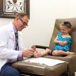 child at doctor&#39;s appointment