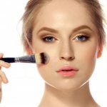 Evening out facial skin tone using cosmetics